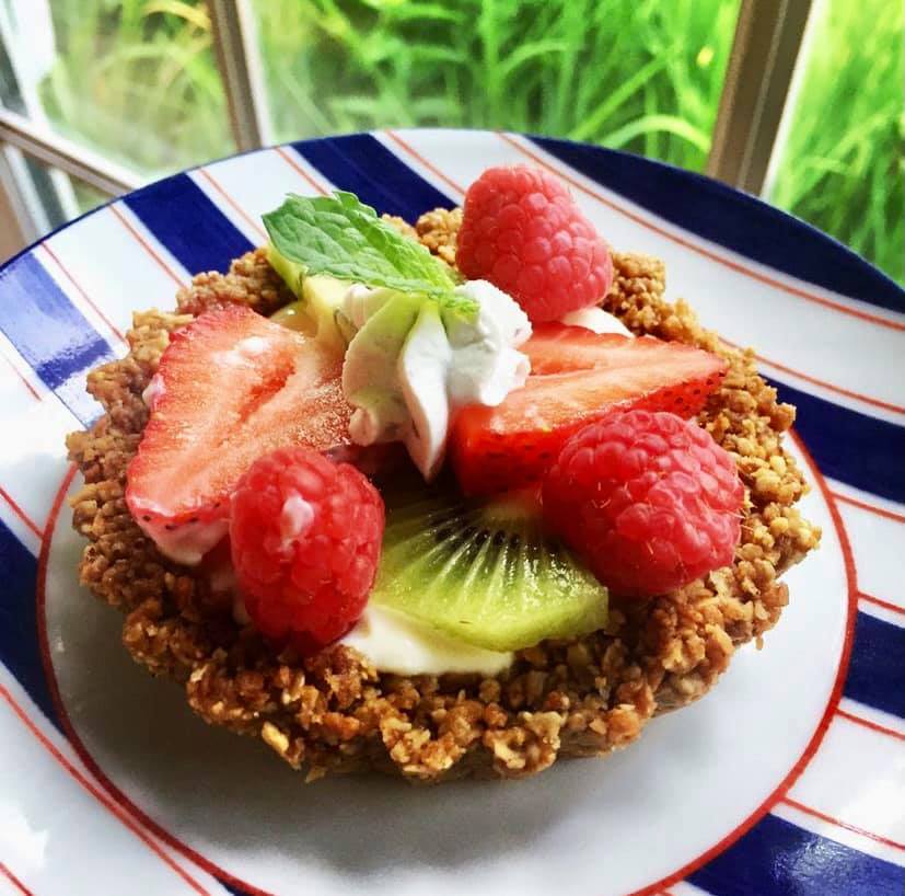 Fresh fruit tart with homemade granola crust.