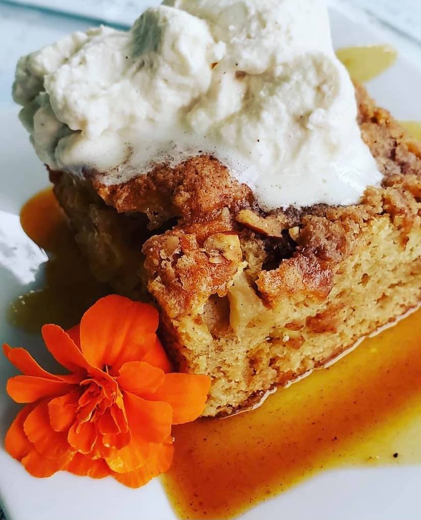 Apple cinnamon coffee cake with pumpkin spice whipped cream.