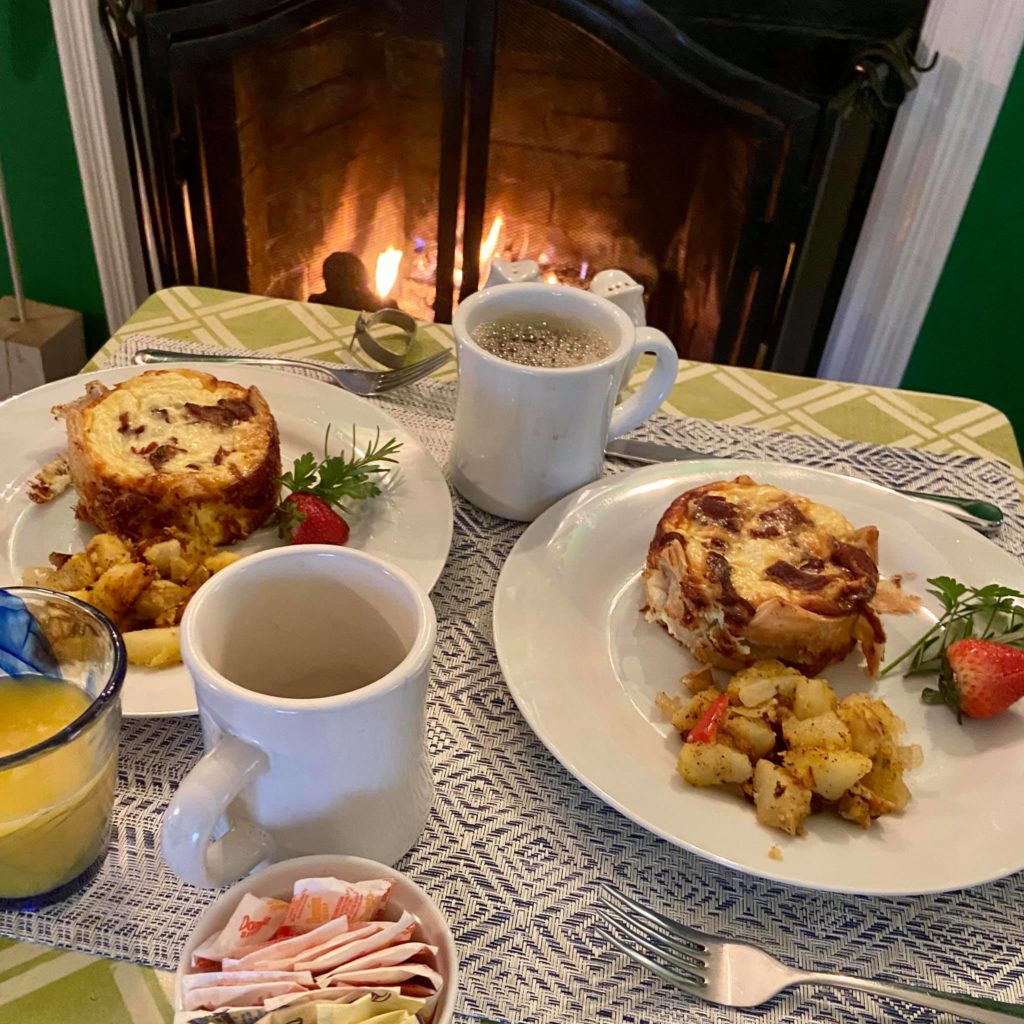 Spread of bacon mushroom and Swiss Quiche, featuring our delicious Trellis House Potatoes!
